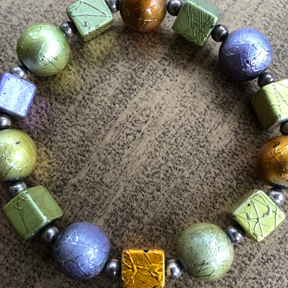 Iridescent beaded bracelet in lavender, sage green, and orange - Picture 3 of 5